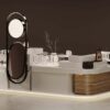 3D render of luxury handbag mall kiosk, glass showcase for high-end bags, matte white fluted panel