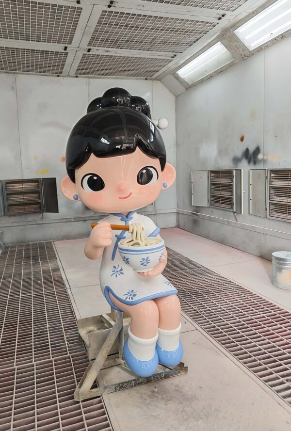 Customized fiberglass display (10) Spray booth workshop shot of glossy FRP food IP mascot statue, cute qipao girl holding noodle bowl for noodle restaurant photo spot