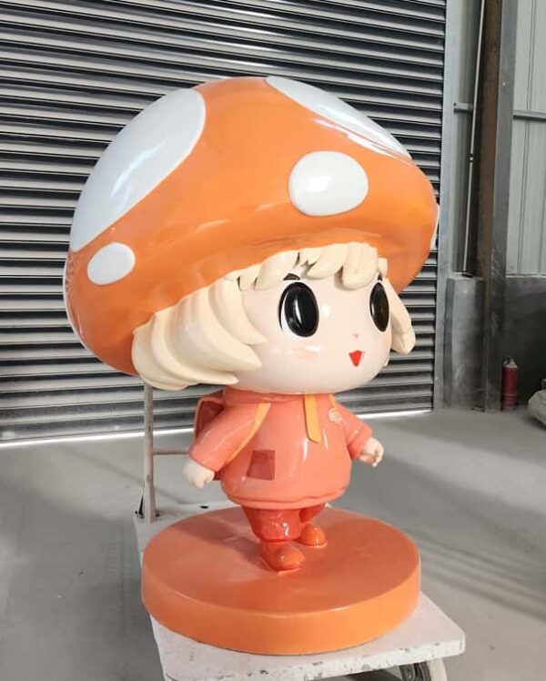 Close-up shot custom cartoon mushroom girl FRP mascot, childlike character sculpture for theme park photo spot decoration