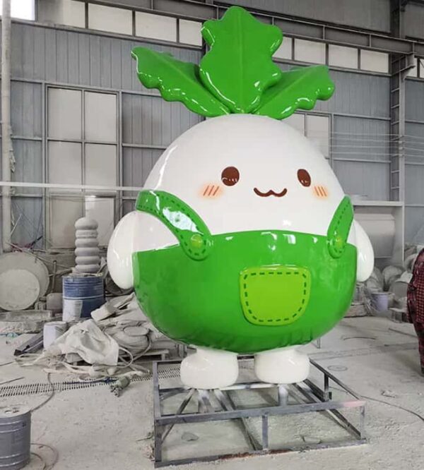 Customized fiberglass display (4) Factory workshop photo of cartoon white radish fiberglass mascot sculpture, cute chibi radish character with green top leaves and green overalls