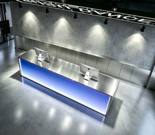 Top view of RGB light up reception counter, brushed stainless steel tabletop for gym front desk