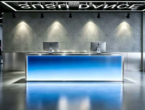 Blue gradient illuminated reception desk, custom commercial front counter for dance school