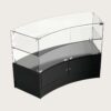 Angled view dual‑option curved glass counter, wooden and black finish retail display fixture`