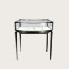 Curved bow‑front black open‑frame jewelry display table matte black metal glass showcase Lexio Display`