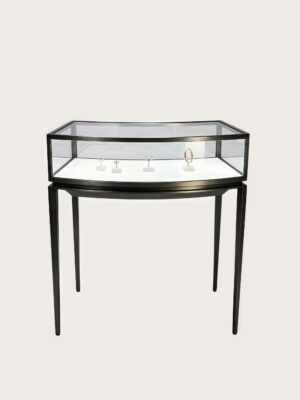 Curved bow‑front black open‑frame jewelry display table matte black metal glass showcase Lexio Display`