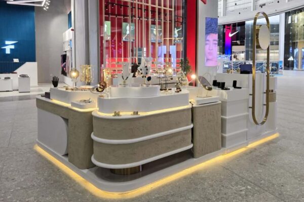 Modern Wavy Shape Jewelry Retail Kiosk, Gold Stainless Steel Frame Jewellery Display Counter