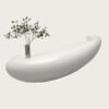 reception desk (1) 1. 3/4 perspective curved oval white fiberglass front desk, integrated drawers and flat working surface for lobby reception