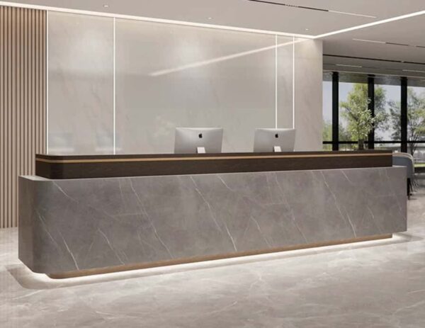 Plain background product shot custom stone reception desk for commercial office fit-out project