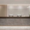 Front view luxury office reception counter, stone veneer facade and wood grain desktop, built-in base ambient light for hotel front desk