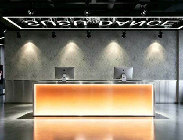 Warm amber gradient light reception counter, commercial furniture for fitness studio reception area